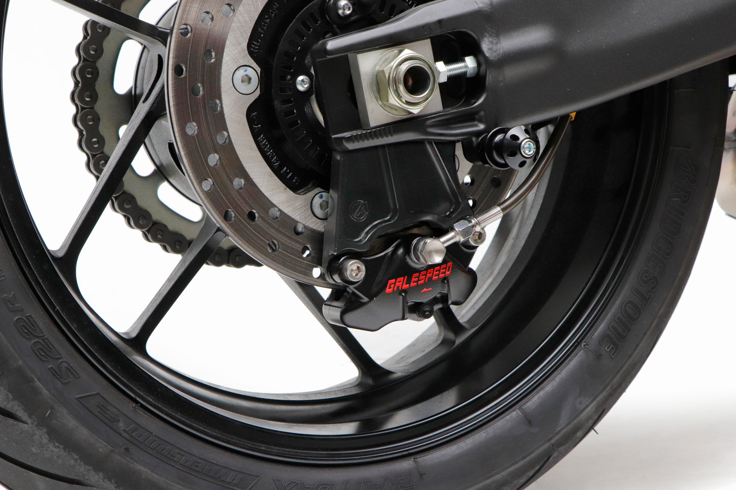 Rear underslung caliper support Yamaha